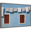 23" X 16" Hanging Laundry Along Wall By Brenda Tharp Danita Delimont Framed Canvas Wall Art Blue - Amanti Art -Home Furniture GUEST 434cf96a 95f0 4a00 8823 2126cc118447